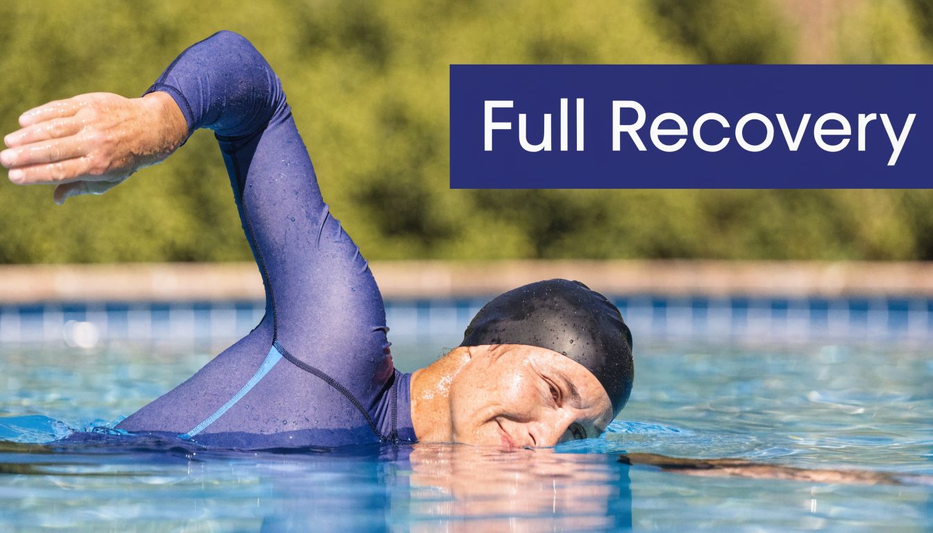 Rotator Cuff Repair: Your Complete Patient Guide 4 A swimmer performs a front crawl stroke in an outdoor pool, representing recovery and active rehabilitation.